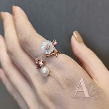 Load and play video in Gallery viewer, Anthia Jewelry Cherry Blossom Pink Gold Flower and Fresh Water Pearl Adjustable Silver Ring
